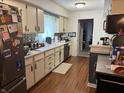 Traditional kitchen with white cabinets, neutral countertops and stainless steel appliances at 5585 Gallagher Dr, Greenwood, IN 46142