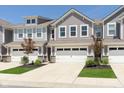 Charming two-story home with a two car garage, complemented by tasteful landscaping at 9570 Beckett St, Avon, IN 46123