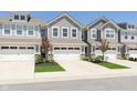 Attractive exterior view showcasing a two-story home with a spacious two car garage and manicured lawn at 9570 Beckett St, Avon, IN 46123