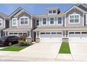 Charming townhome with a two-car garage, well-maintained landscaping, and inviting curb appeal at 9652 Beckett St, Avon, IN 46123