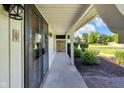Cozy covered front porch perfect for relaxing and enjoying the outdoors at 7035 Creekside Ln, Indianapolis, IN 46220