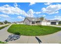 Inviting community street view showcasing sidewalks, green lawns and well-maintained single-Gathering homes at 104 Maxim Ct, Cumberland, IN 46229