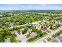 Community aerial view with mature trees, green spaces, and easy access to the city at 6026 Pennyworth Cir, Indianapolis, IN 46203