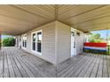 Inviting covered porch with a swing, perfect for relaxing outdoors at 1237 W State Rd 38, Pendleton, IN 46064