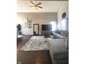 Inviting living room with neutral tones, large windows, and stylish decor at 1304 Crescent Dr, Greenwood, IN 46143