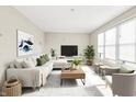Bright and airy living room featuring stylish decor, large windows, and a comfortable seating area at 2150 S Emerson Ave, Indianapolis, IN 46203
