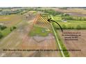 Aerial view outlining property boundaries with a home and surrounding acreage at 3319 E 700 N, Whiteland, IN 46184
