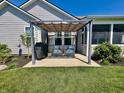 Cozy backyard patio with comfortable seating, perfect for outdoor relaxation and entertaining at 3691 Talmine Ln, Bargersville, IN 46106