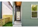 Close up of home entry with wooden porch ceiling at 39 N Walcott St, Indianapolis, IN 46201