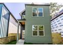 View of a two-story home showing the entry and under construction exterior at 39 N Walcott St, Indianapolis, IN 46201