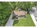 Aerial view of the property and mature trees at 6110 Orinoco Ave, Indianapolis, IN 46227