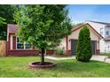 This cozy one-story home has a well-manicured lawn and mature landscaping at 6715 Wandering Way, Indianapolis, IN 46241