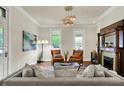 Cozy living room featuring a decorative fireplace, stylish furnishings, and neutral color palette at 847 N Park Ave, Indianapolis, IN 46202
