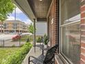 Cozy front porch area with outdoor seating and views of the neighborhood at 914 N College Ave, Indianapolis, IN 46202