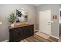 Welcoming entryway featuring a stylish console table and a neutral color palette at 16419 Connolly Dr, Westfield, IN 46074
