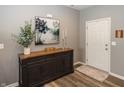Inviting entryway with hardwood floors, decorative furniture, and stylish accents at 16419 Connolly Dr, Westfield, IN 46074