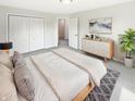Comfortable main bedroom featuring a large bed, closet, and stylish decor at 2913 Lily Dr, Lebanon, IN 46052