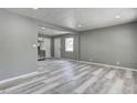 Spacious living room with gray walls and modern flooring at 3072 Falcon Dr, Indianapolis, IN 46222