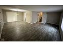 Open living room showcases modern floors and a staircase leading to the upper level at 3628 Breen Dr, Indianapolis, IN 46235