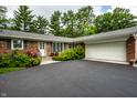 A well-kept brick home with a two-car garage and clean, modern updates at 5415 Kilmer Ln, Indianapolis, IN 46250