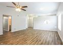 Bright living room featuring modern flooring, recessed lighting and an open layout at 6121 Jester Ct, Indianapolis, IN 46254
