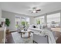 Inviting living room features lots of natural light, hardwood floors, and neutral decor at 6528 Abby Ln, Zionsville, IN 46077
