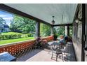 Inviting front porch with comfortable seating area for relaxing and entertaining at 710 N Spring St, Greenfield, IN 46140