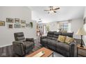 Cozy living room features plush seating, stylish decor, and ample natural light, perfect for relaxation at 11209 Black Gold Dr, Noblesville, IN 46060