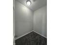 Cozy walk-in closet with gray walls, neutral carpeting and ample space at 223 N Coventry Dr, Anderson, IN 46012