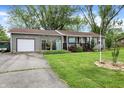 Ranch home with garage and nice yard at 3552 N Talley Rd, Columbus, IN 47203