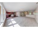 Spacious living room features plush carpeting, ample natural light and an open floorplan at 4055 Steelewater Way, Indianapolis, IN 46235
