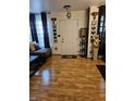 Inviting living room featuring stylish decor, warm hardwood floors, and ample natural light at 4962 Potomac Square Pl, Indianapolis, IN 46268