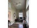 Cozy living room with vaulted ceilings, modern decor, and bright natural light at 1931 E 68Th St, Indianapolis, IN 46220