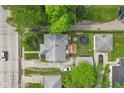 Birds-eye view of property featuring a fenced backyard with trampoline, garage, and a wooden deck at 376 S Arlington Ave, Indianapolis, IN 46219
