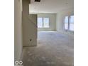 Bright living room featuring large windows that allow ample natural light into the space at 3897 Berkdale Ct, Columbus, IN 47203