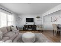 Bright and inviting living room with hardwood floors, neutral colors, and modern furnishings, creating a cozy atmosphere at 469 Ash Dr, Carmel, IN 46032
