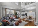 Spacious living room seamlessly connecting to a modern kitchen, perfect for entertaining and Gathering gatherings at 654 N Senate Ave, Indianapolis, IN 46202