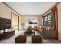 Well-lit living room featuring neutral tones and ample seating at 659 Carson Ct, Carmel, IN 46033