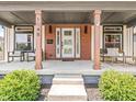 Inviting front porch featuring comfortable seating, modern accents, and an appealing entrance at 1048 St Peter St, Indianapolis, IN 46203