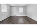 Inviting living room with modern flooring and natural light at 1521 N Gladstone Ave, Indianapolis, IN 46201