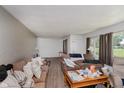 Spacious living room with large windows for ample natural light at 4232 Linden Ln, Anderson, IN 46011
