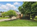 Well-maintained lawn and garden compliment this attractive single-Gathering home at 7329 Pymbroke Dr, Fishers, IN 46038