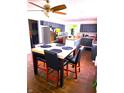 Spacious kitchen with granite island, stainless steel appliances, and tile flooring at 8357 Harrison Dr, Lawrence, IN 46226