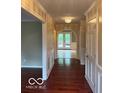 Elegant hallway with hardwood floors and detailed trim at 9650 Copley Dr, Carmel, IN 46290