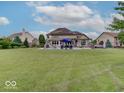 Large backyard with pool and plenty of space for outdoor activities at 11521 Willow Bend Dr, Zionsville, IN 46077