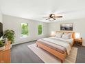 Serene bedroom with a comfortable bed, soft lighting, and a soothing ambiance for relaxation at 2116 Orchid Bloom Dr, Indianapolis, IN 46231