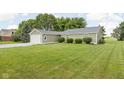 A charming single-story home featuring an attached one car garage and well maintained yard at 3020 E 400 S, Lebanon, IN 46052