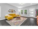 Comfortable living room with hardwood floors and a decorative area rug at 353 S Indiana St, Danville, IN 46122