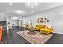 Bright living room with a modern design featuring hardwood floors and ample natural light at 353 S Indiana St, Danville, IN 46122