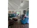 Inviting living room boasts vaulted ceilings and a cozy atmosphere at 4115 Tansel Rd, Indianapolis, IN 46234